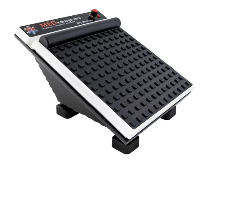 Foot massager with a black textured surface and red power dial.