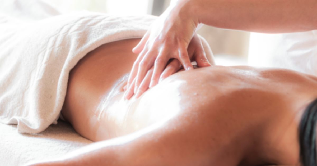 A soothing massage session in a serene spa environment promoting relaxation and wellness.