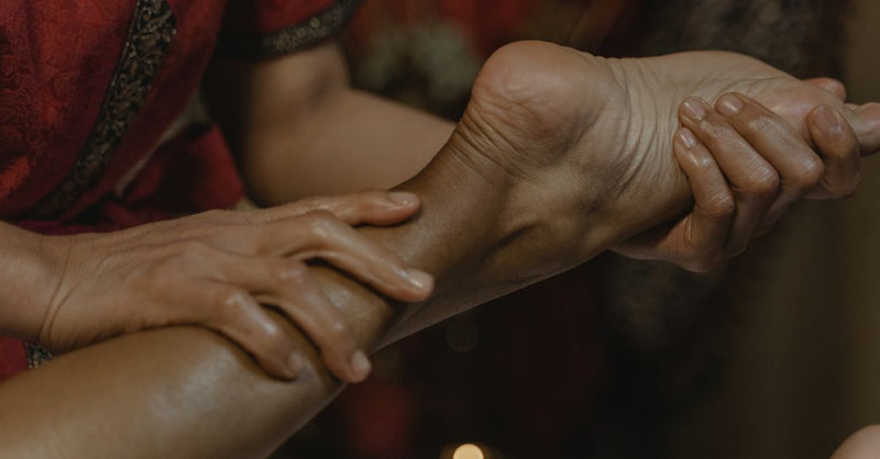 Close-up of a soothing foot massage at a spa, promoting relaxation and wellness.