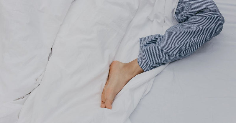 Leg Cramps at Night: Causes, Prevention & Evening Massage